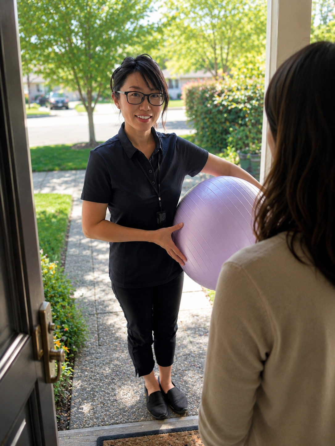 Michiko arriving at a patient's home with physiotherapy equipment